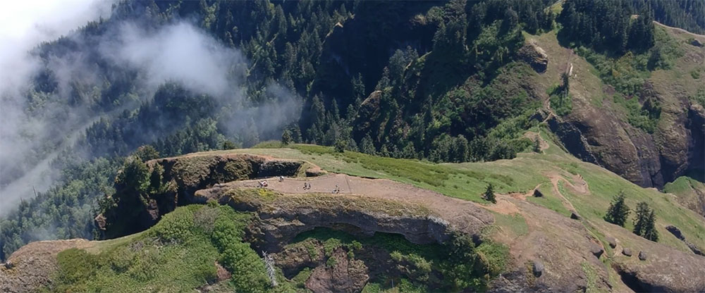 image of a green hillside taken from a drone-mounted camera