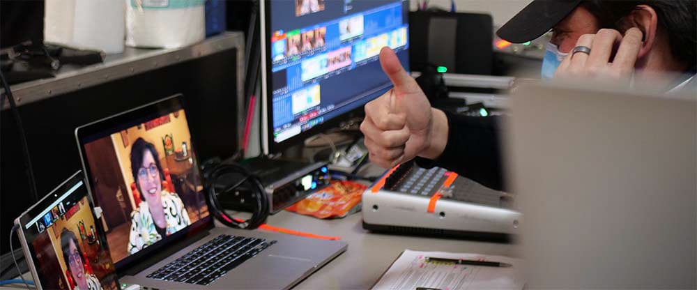 Virtual Conference Technical Director Prepares a Guest to Go Live