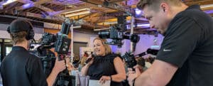 A Sizzle reel is filmed during a conference